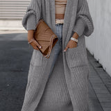 Suri™ | Elegant Deep V-Neck Cardigan - Comfort and Elegance